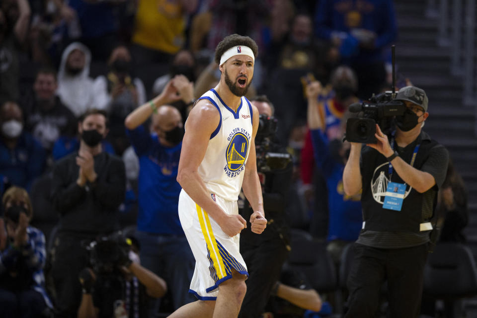 Golden State Warriors guard Klay Thompson celebrates. 