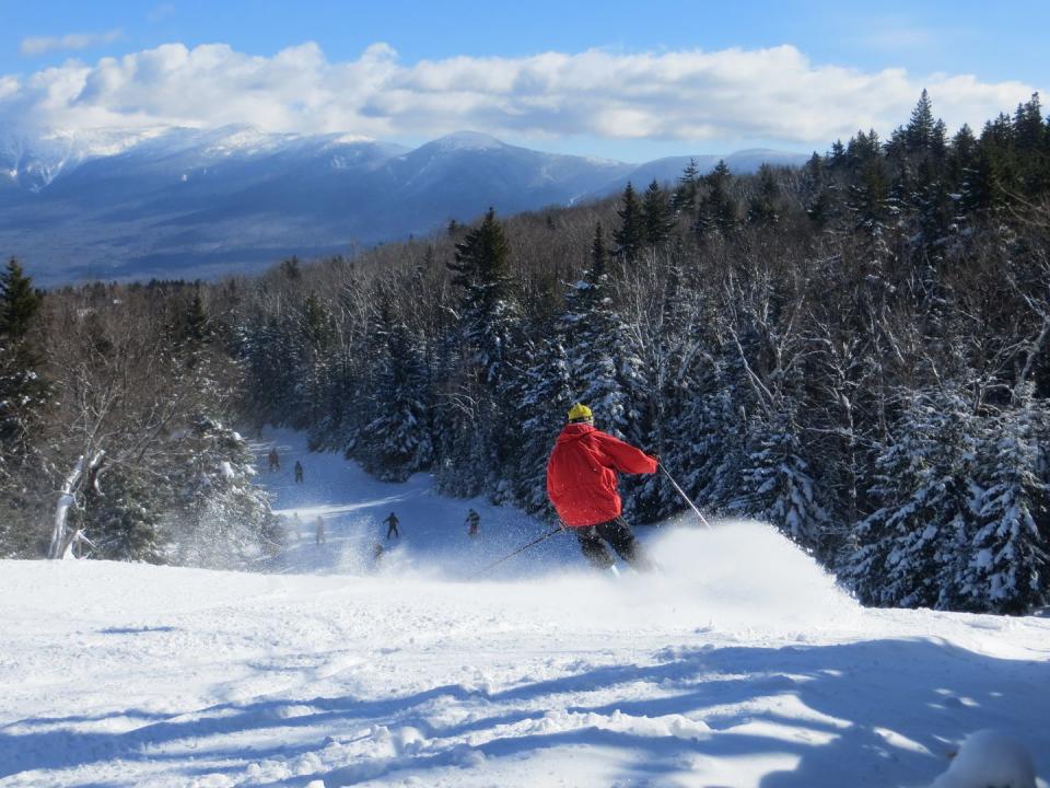 a person skiing down a mountain