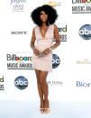 Call me crazy (no, I'm not referencing the Carly Rae Jepsen song), but I think Brandy stole the spotlight at last weekend's Billboard Music Awards. She didn't win any trophies that night, but she certainly won the red carpet race in this to-die-for Herve Leger by Max Azria mini and rose gold Louboutin slingbacks. And her 'fro ... fabulous! (5/20/2012).