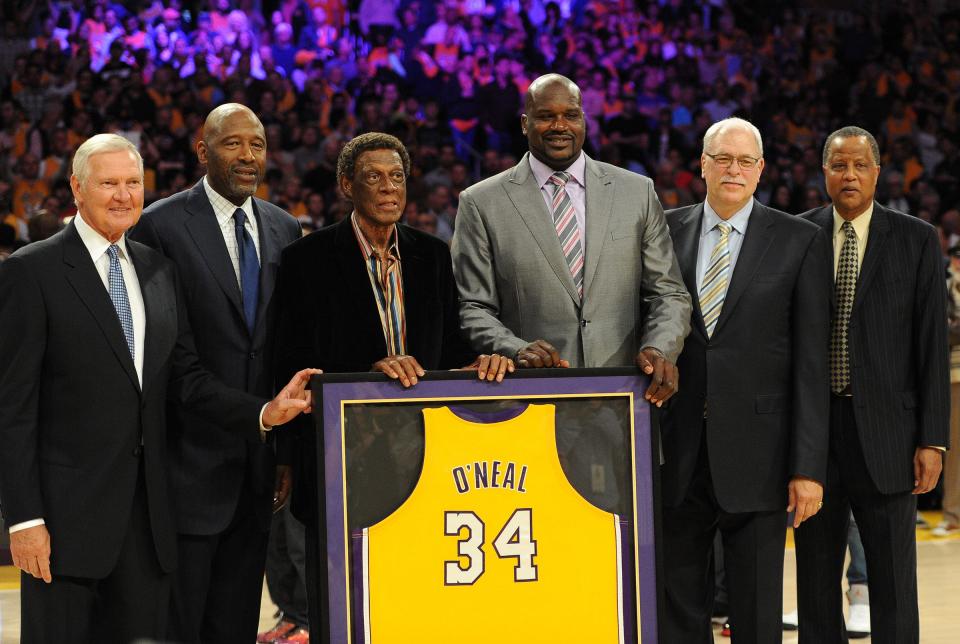 From left to right, Lakers former members Jerry West, James Worthy, Elgin Baylor, Phil Jackson Jamal Wilkes join Shaquille O'Neal for a ceremony to retire his jersey.