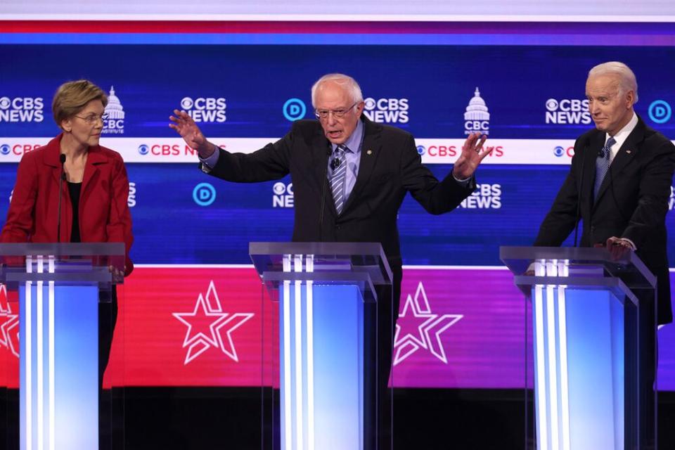 From left: Sen. Elizabeth Warren, Sen. Bernie Sanders and former Vice President Joe Biden at Tuesday's Democratic debate in South Carolina | Win McNamee/Getty Images