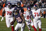 Chicago Bears safety Tashaun Gipson returns his interception off New York Giants quarterback Mike Glennon during the first half of an NFL football game Sunday, Jan. 2, 2022, in Chicago. (AP Photo/David Banks)