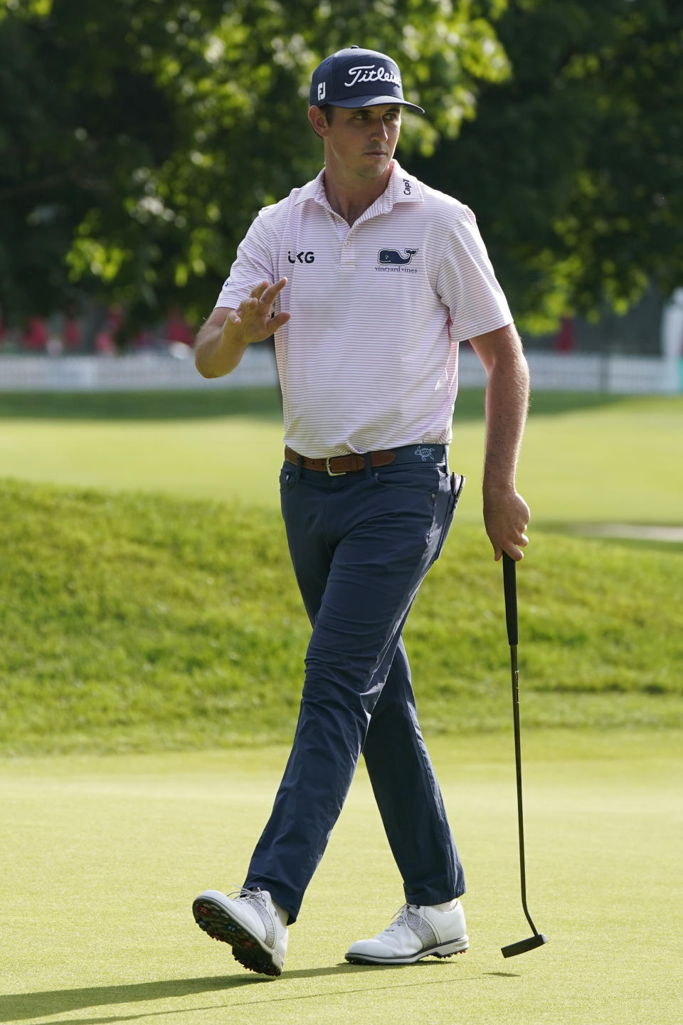 J.T. Poston reacts after finishing his round on the ninth hole during the first round of the Travelers Championship golf tournament at TPC River Highlands, Thursday, June 23, 2022, in Cromwell, Conn. (AP Photo/Seth Wenig)