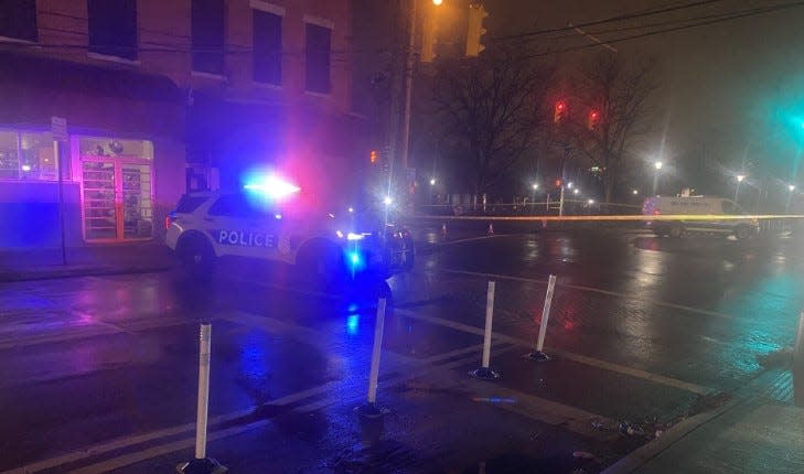 Columbus police surround the area of North 20th Street and Mt. Vernon Avenue in the King-Lincoln Bronzeville neighborhood with crime scene tape Tuesday evening, Dec. 5, 2023, while homicide detectives investigate a fatal shooting.