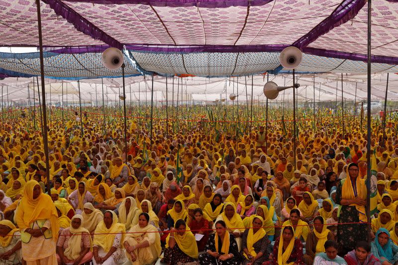 Women farmers attend a protest against farm laws on the occasion of International Women's Day at Bahadurgar