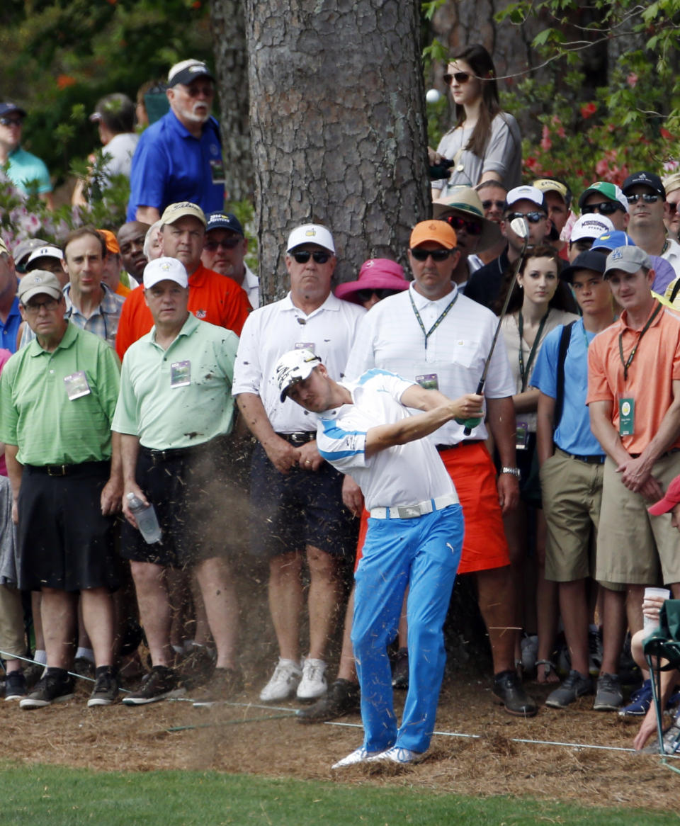 Jonas Blixt, of Sweden, hits out of the rough off the second fairway during the fourth round of the Masters golf tournament Sunday, April 13, 2014, in Augusta, Ga. (AP Photo/Matt Slocum)