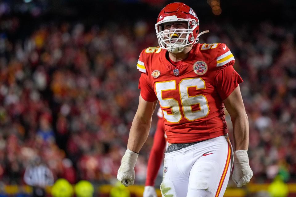 Kansas City Chiefs defensive end George Karlaftis (56) celebrates a stop in the fourth quarter of the NFL Week 17 game between the Kansas City Chiefs and the Cincinnati Bengals at Arrowhead Stadium in Kansas City, Mo., on Sunday, Dec. 31, 2023. The Chiefs won 25-17 to clinch the AFC West Championship.