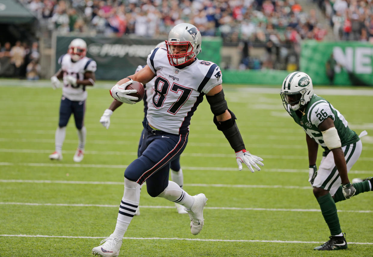 New England Patriots’ Rob Gronkowski (87) runs away from New York Jets’ Marcus Maye (26) for a touchdown last season. (AP)