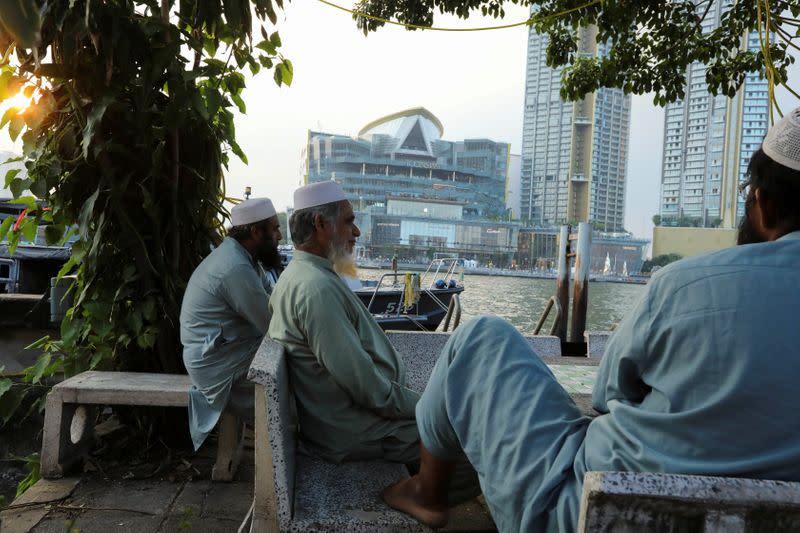 The Wider Image: In old Bangkok, a goddess resists a wave of gentrification