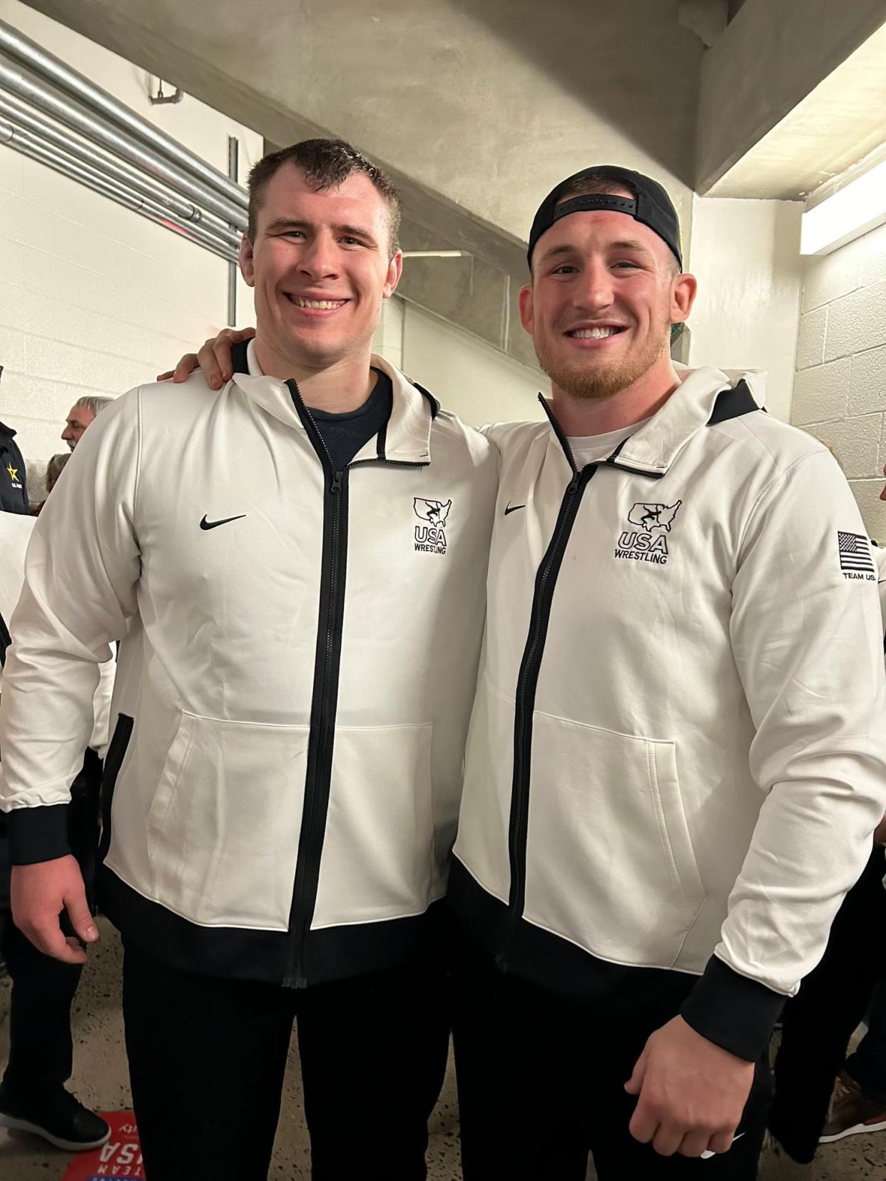 Former University of Michigan wrestlers Adam Coon (left) of Fowlerville and Mason Parris won 130-kilogram titles in Greco-Roman and freestyle, respectively, at the U.S. Olympic Team Trials.