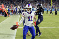 Buffalo Bills wide receiver Cole Beasley (11) tosses the ball away after catching a touchdown pass against the Tennessee Titans in the first half of an NFL football game Monday, Oct. 18, 2021, in Nashville, Tenn. (AP Photo/Mark Zaleski)