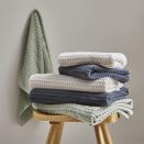 <p>Made from 100% cotton, these towels come in a tasteful edit of soft, natural colours (‘Sage’, ‘Mushroom’ and ‘Graphite’ pictured) and offer a textural quality that belies their affordable price tag. From £6 each, <a href="https://www.dunelm.com/product/sage-green-waffle-100-cotton-towel-1000186086" rel="nofollow noopener" target="_blank" data-ylk="slk:dunelm.com;elm:context_link;itc:0;sec:content-canvas" class="link ">dunelm.com</a></p>