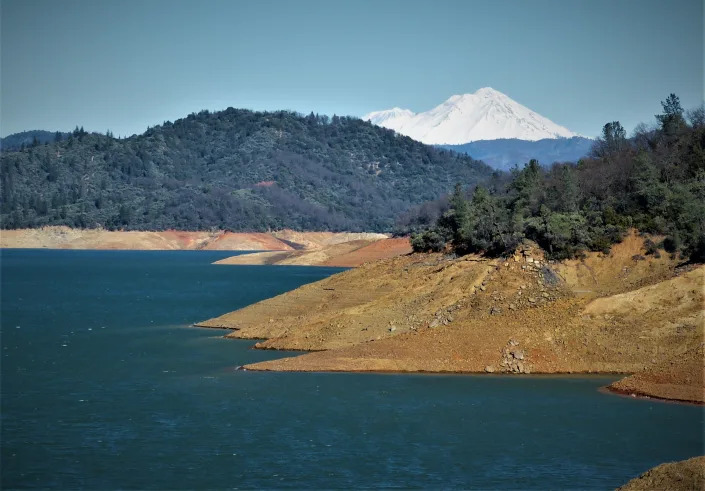 Mt. Shasta can be seen in the distance north of Lake Shasta, which rose 60 feet in January.