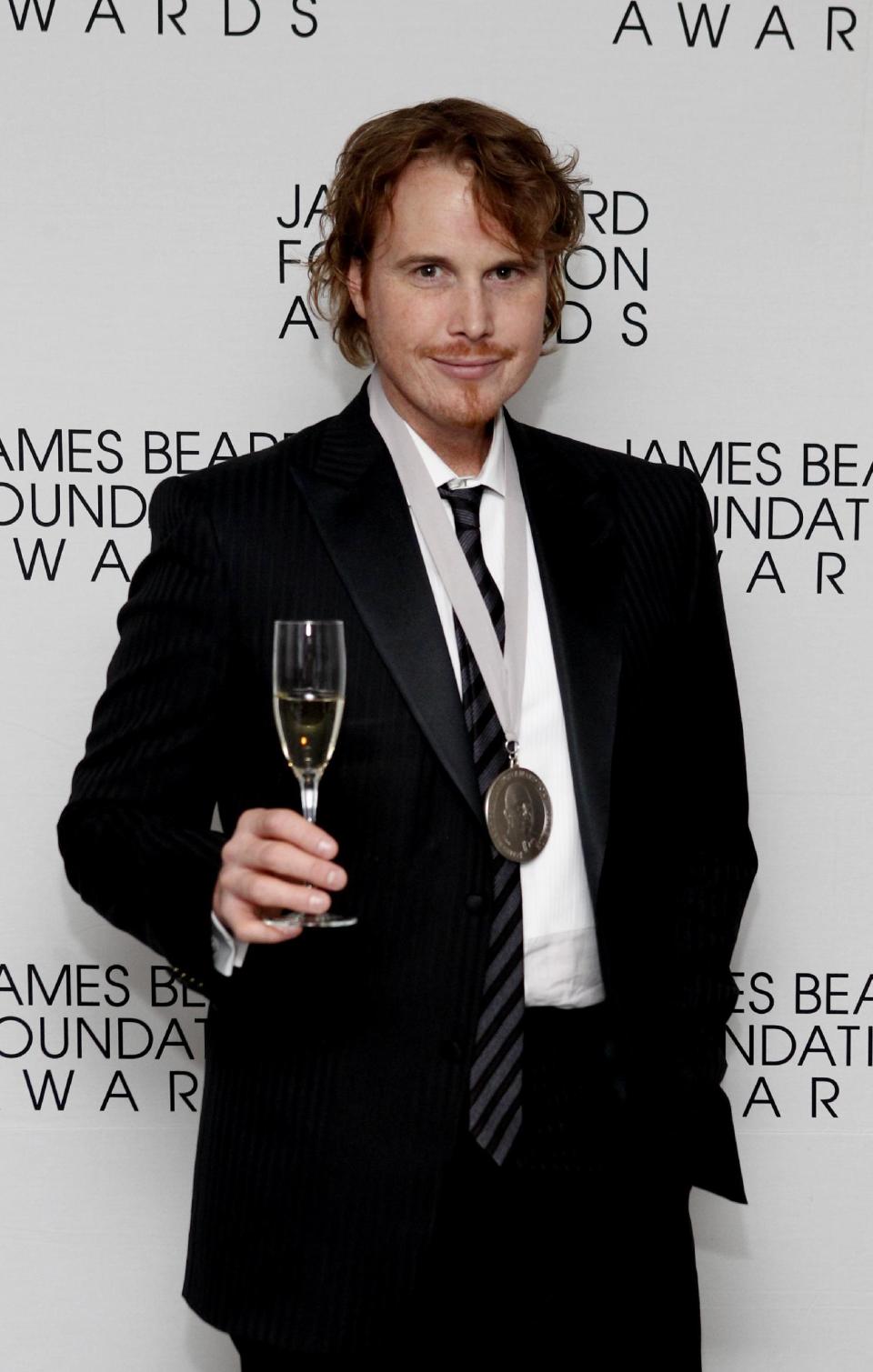 Chef Grant Achatz poses after his Who's Who of Food & Beverage in America induction during the James Beard Foundation Awards, Monday, May 7, 2012, in New York. (AP Photo/Jason DeCrow)