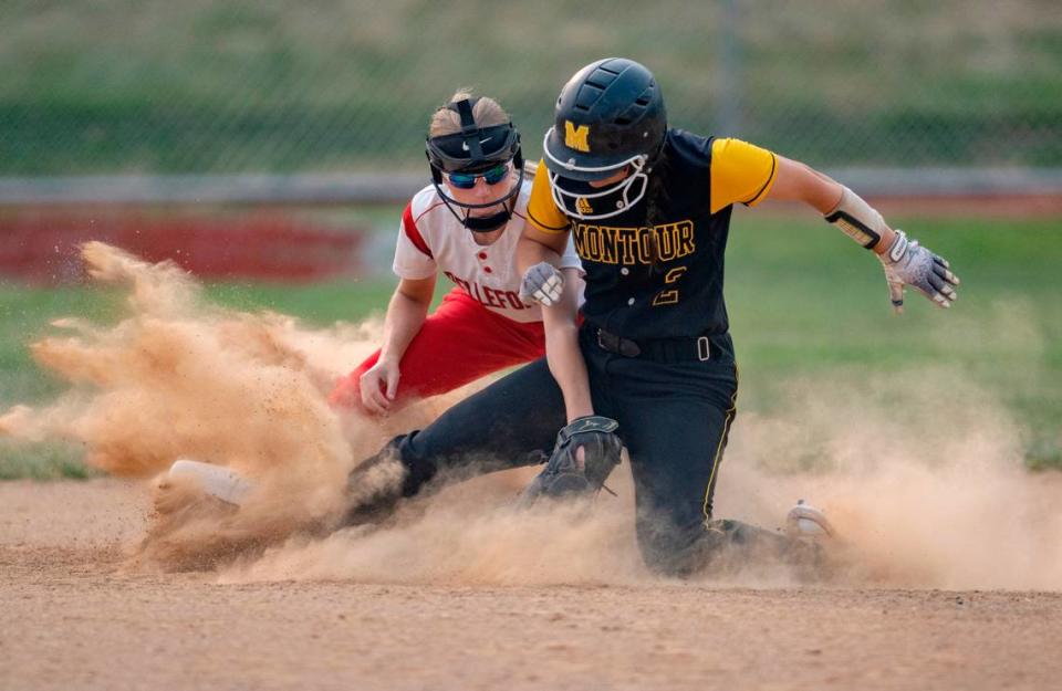 Bellefonte’s Kierra Narehood tags out Montour’s Gia LaBrie during the first round game of the PIAA class 4A softball playoffs on Monday, June 5, 2023.