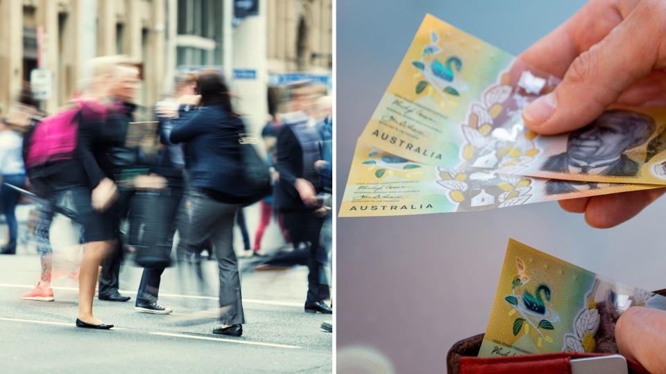 Blurred image of Australian pedestrians in CBD, hands holding Australian $50 notes and wallet. 