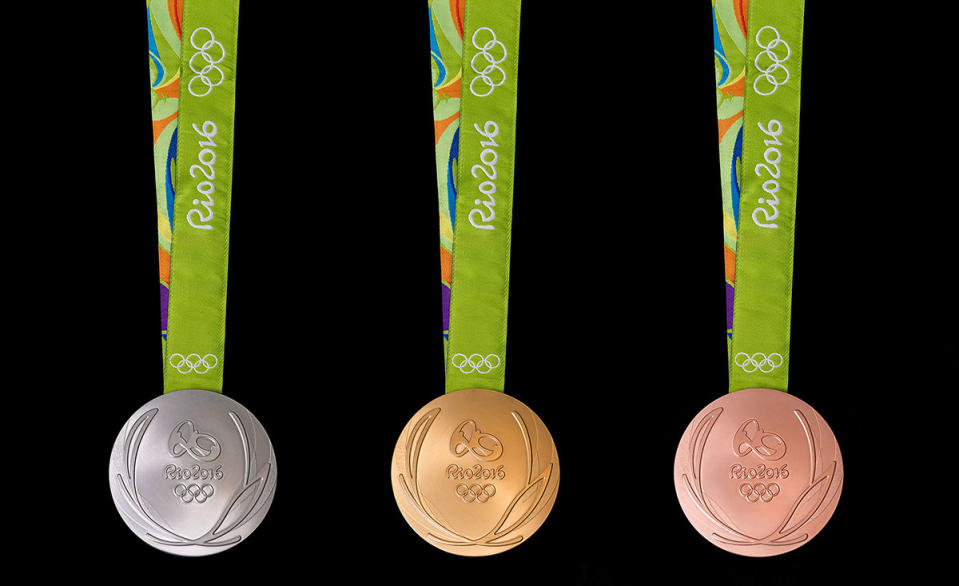 <p>The front of the gold, silver and bronze medals for the <a rel="nofollow" href="http://sports.yahoo.com/blogs/olympics-fourth-place-medal/your-first-look-at-the-rio-2016-olympic-medals-200813715.html" data-ylk="slk:Rio 2016;elm:context_link;itc:0;sec:content-canvas;outcm:mb_qualified_link;_E:mb_qualified_link;ct:story;" class="link  yahoo-link">Rio 2016</a> Summer Olympics. (Alex Ferro/Jogos Rio 2016 via Getty Images) </p>