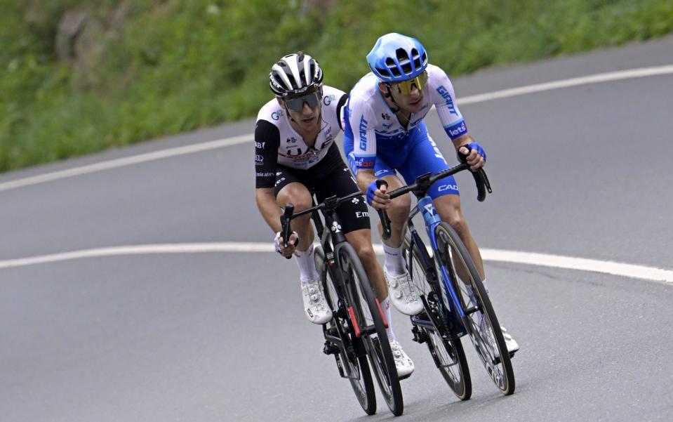 Twins Adam (left) and Simon Yates have got away at the front