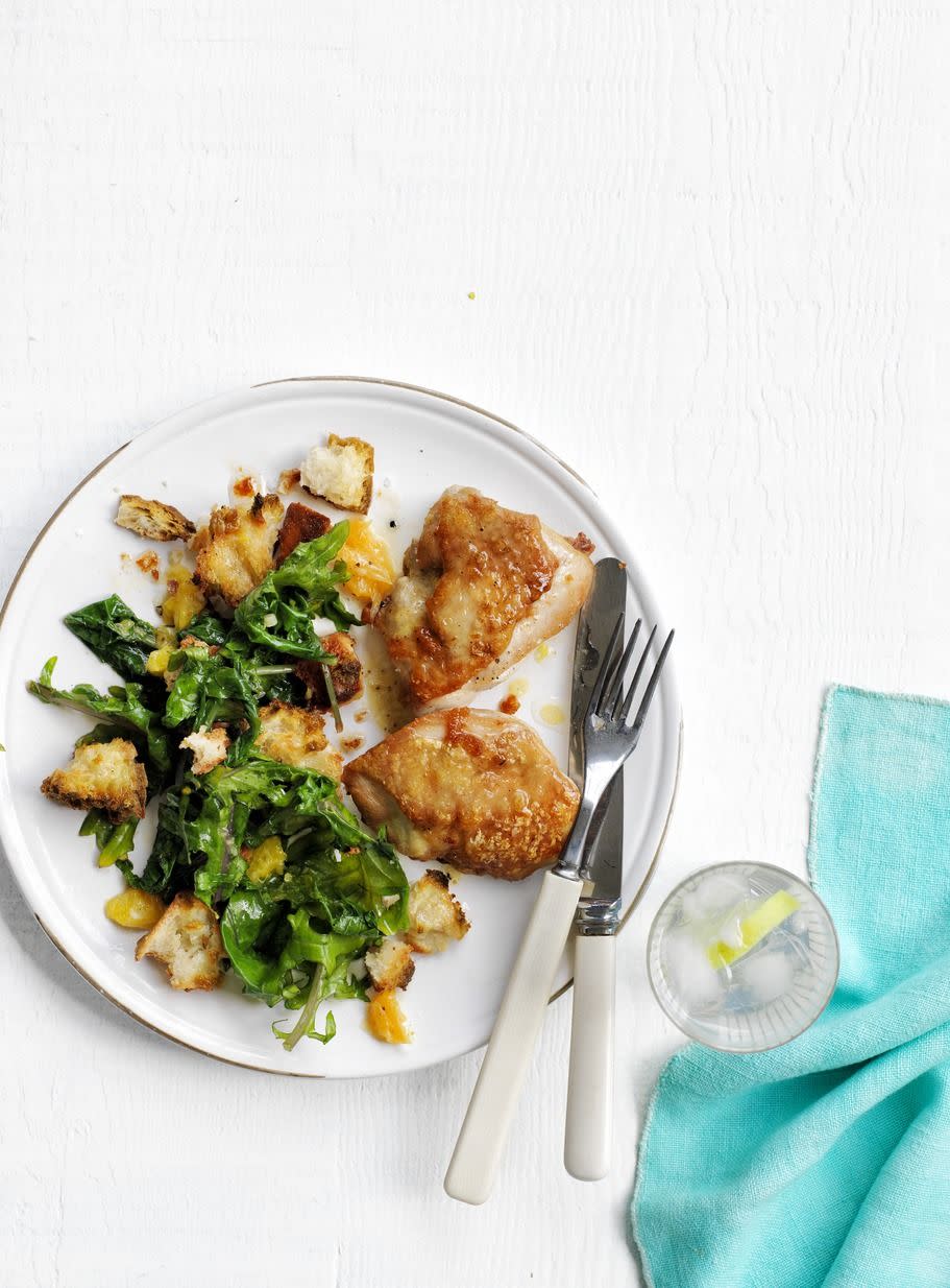 <p>This to-die-for dish calls for juicy chicken thighs cooked with orange slices and a lemony kale-and-crouton salad. </p><p><em><a href="https://www.womansday.com/food-recipes/food-drinks/recipes/a50199/roasted-citrus-chicken-salad-recipe-wdy0515/" rel="nofollow noopener" target="_blank" data-ylk="slk:Get the Roasted Citrus Chicken Salad recipe.;elm:context_link;itc:0;sec:content-canvas" class="link ">Get the Roasted Citrus Chicken Salad recipe. </a></em></p>