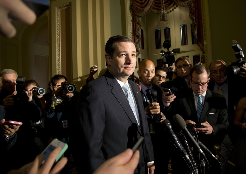 Sen. Ted Cruz, R-Texas, pause as he speaks with reporters on Capitol Hill, Wednesday, Oct. 16, 2013, in Washington. (AP Photo/Carolyn Kaster)
