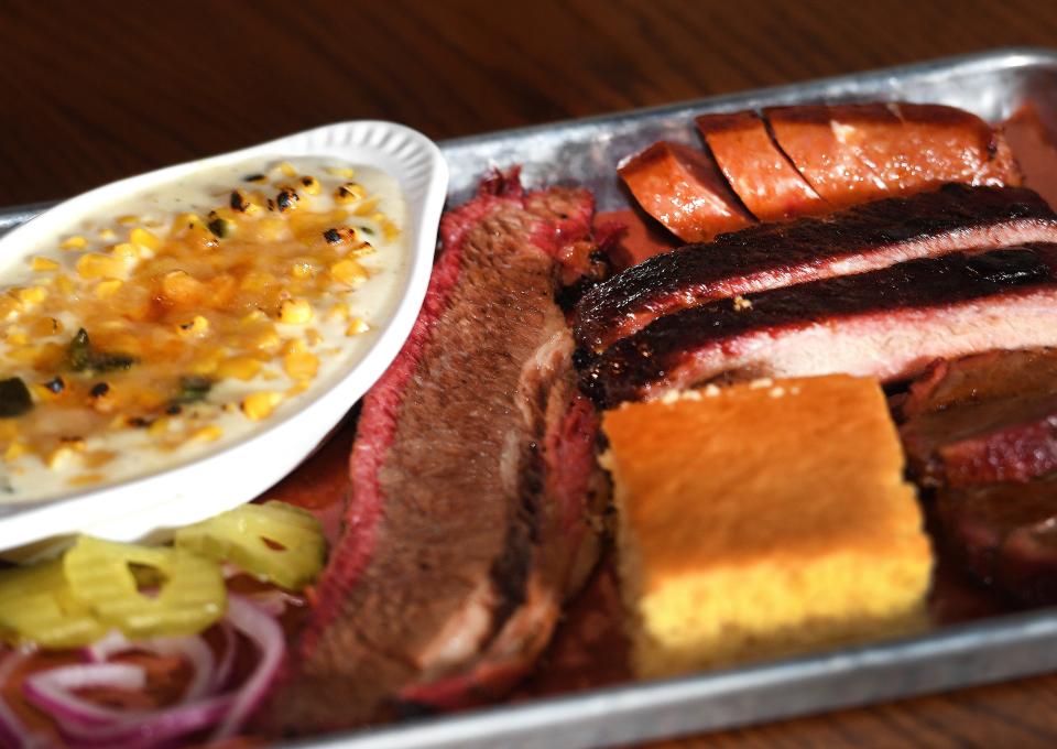 Smoking Butt Heads BBQ restaurant is now open in downtown Spartanburg. The restaurant's lower and upper floors have been updated and remodeled. This is the a Judges Plate: 1/4 Lb. Prime Brisket, 2 St. Louis ribs, 2 pork medallions, 1/2 hot link, choice of sides, and cornbread.