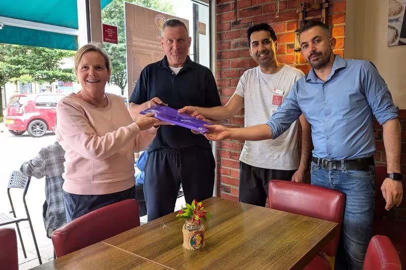 Cllr Susan Elsmore (left) receives a petition from (left-right) Richard Swanbo (Laura's Greengrocers), Zohaib Hussain (Zero Plus Fish & Chips), Salvatore Vara (Calabrisella)