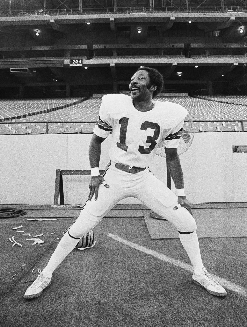 FILE - Cincinnati Bengals cornerback Ken Riley loosens up in Pontiac, Mich., Jan. 21, 1982, as the team begins their daily workout in preparation for NFL football Super Bowl 16 against the San Francisco 49ers. Riley is among those who were voted into the Pro Football Hall of Fame, it was announced Thursday, Feb. 9, 2023. (AP Photo, File)