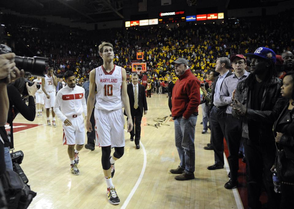 Maryland guard/forward Jake Layman (10) walks off the court after losing to Syracuse 57-55 in an NCAA college basketball game, Monday, Feb. 24, 2014, in College Park, Md. (AP Photo/Nick Wass)