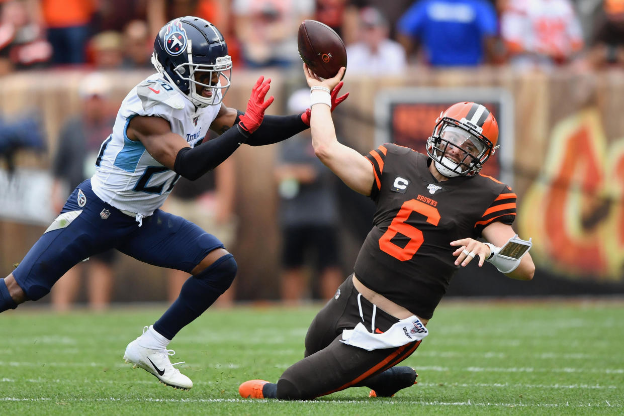 CLEVELAND, OH - SEPTEMBER 08:  Quarterback Baker Mayfield #6 of the Cleveland Browns is sacked by Logan Ryan #26 of the Tennessee Titans in the second quarter at FirstEnergy Stadium on September 08, 2019 in Cleveland, Ohio . (Photo by Jamie Sabau/Getty Images)