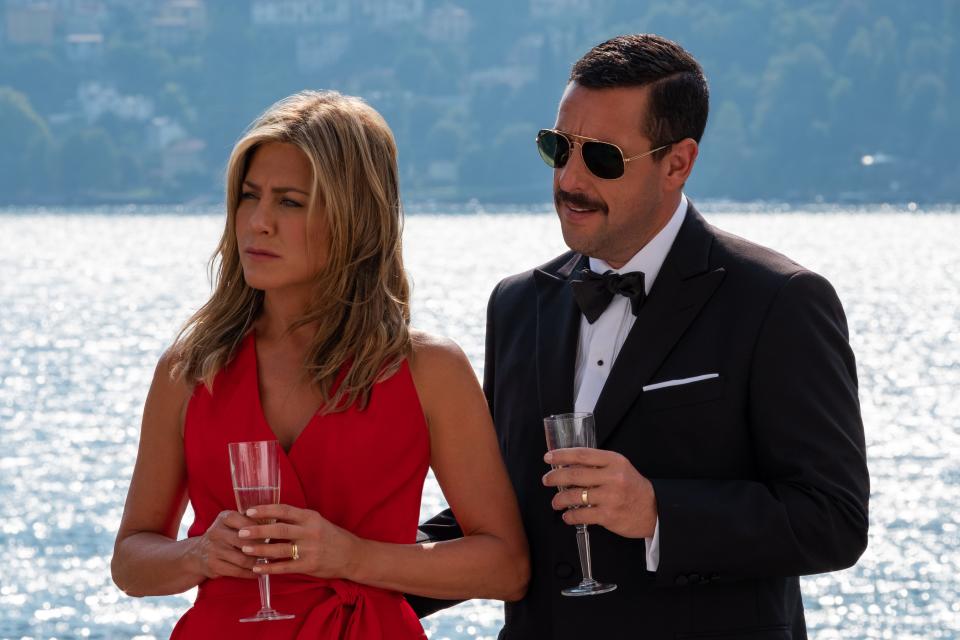 A New York cop (Adam Sandler, right) and his wife (Jennifer Aniston) become the prime suspects in a murder during a trip to Europe in the ensemble comedy "Murder Mystery."