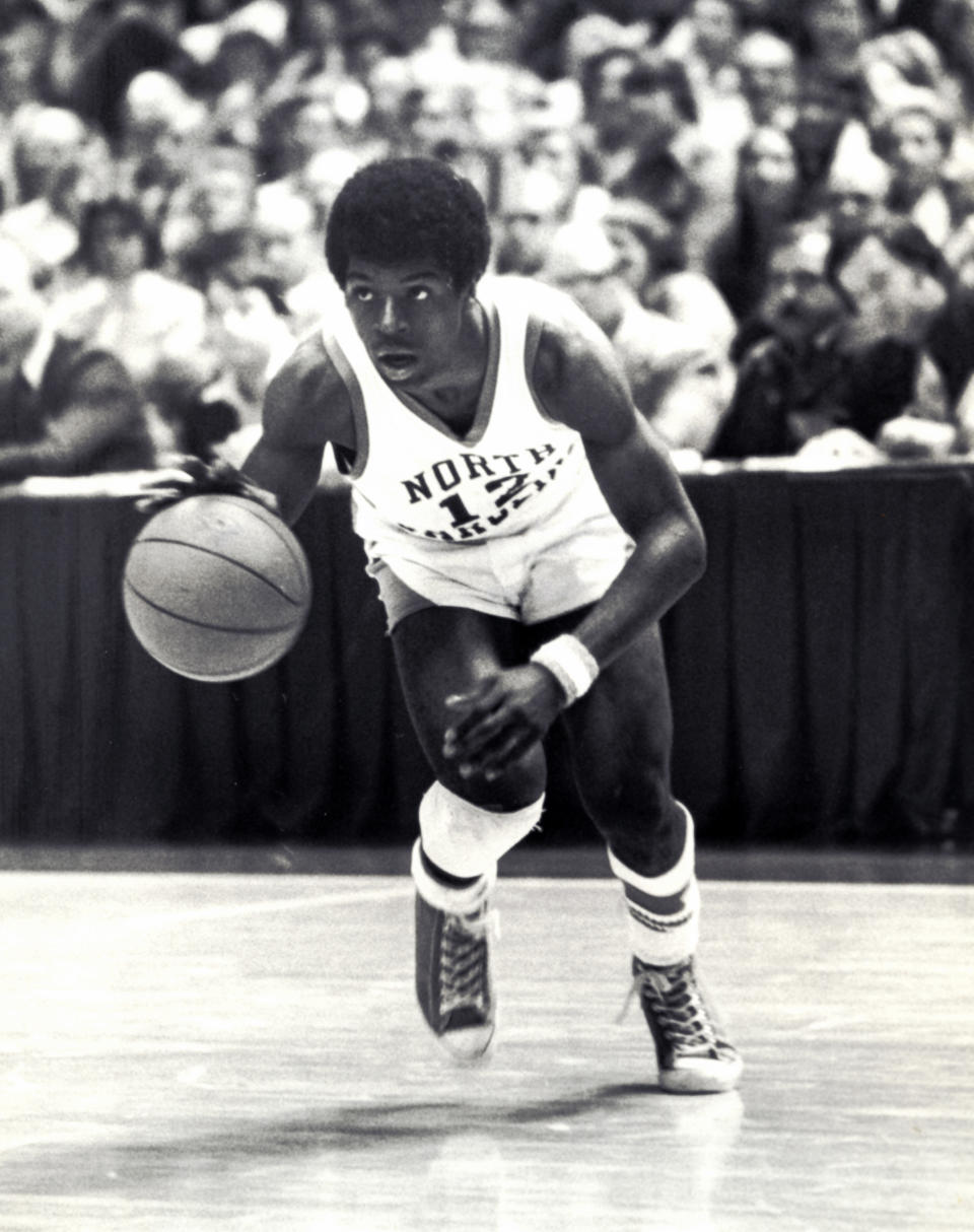 Mar, 1977; Unknown location, USA; FILE PHOTO; North Carolina Tar Heels guard Phil Ford (12) in action. Mandatory Credit: Malcolm Emmons- USA TODAY Sports