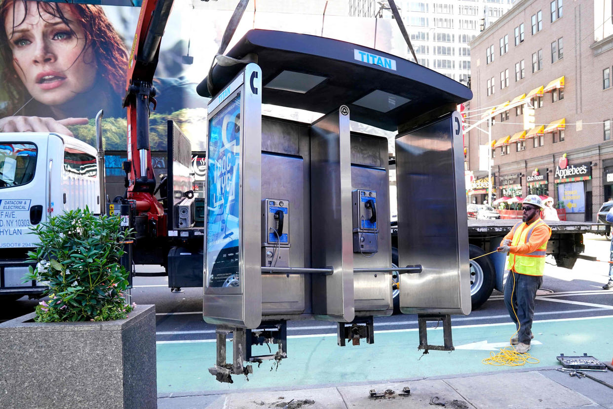Image: US-COMMUNICATION-PAYPHONES (Timothy A. Clary / AFP - Getty Images)