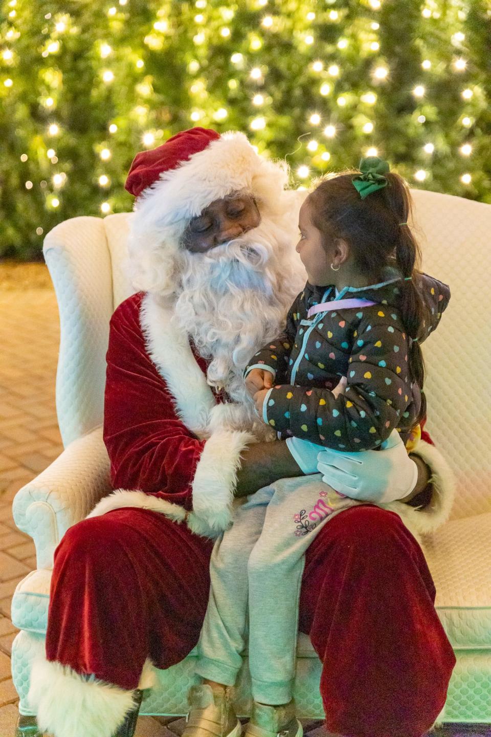 Santa was on hand at Selby Gardens' Lights in Bloom event to sit for photos and hear children’s wishes.