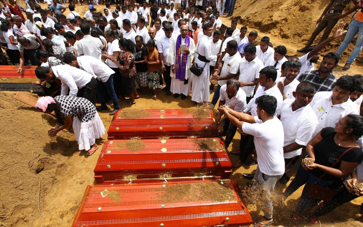 A funeral ceremony for the victims of the Easter Sunday terror attacks in near the devastated church of St Sebastian in Negombo, Sri Lanka - Anadolu