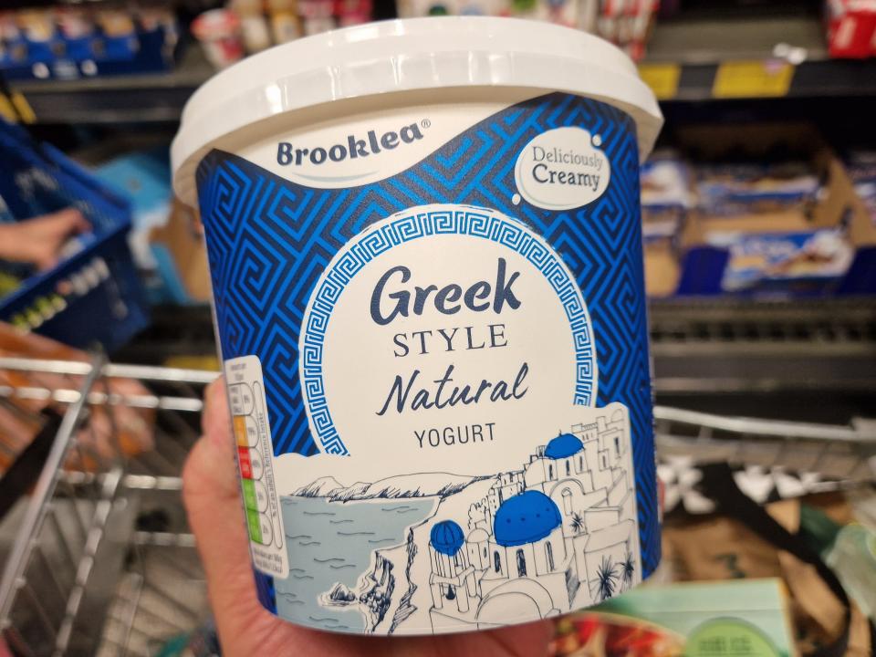 The writer holds Brooklea Greek-style yogurt