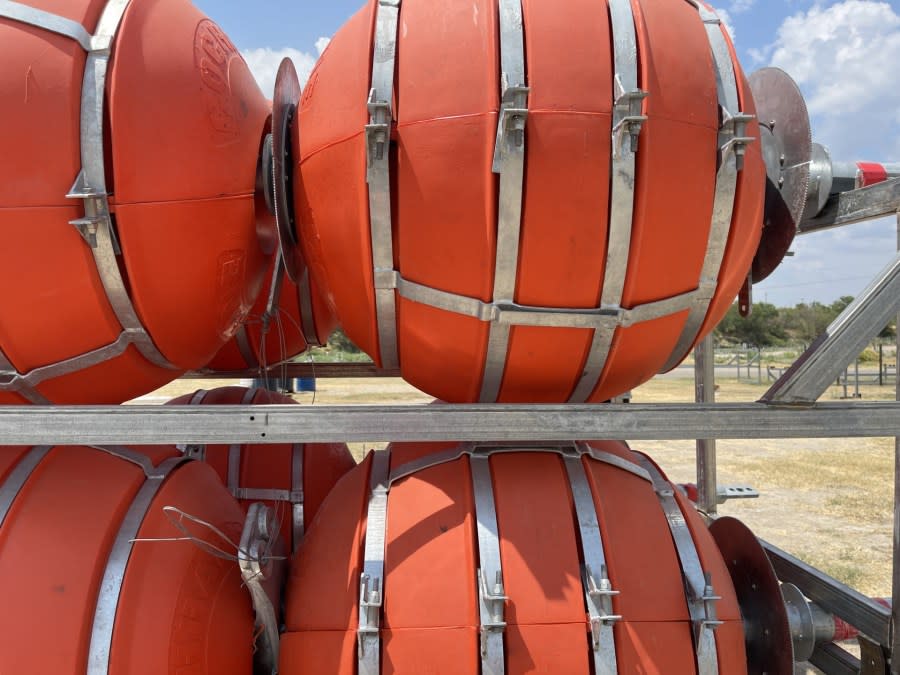 The 1,000-foot string of buoys cost Texas $1 million to install in the Rio Grande in Eagle Pass, Texas. (Sandra Sanchez/Border Report file photo)
