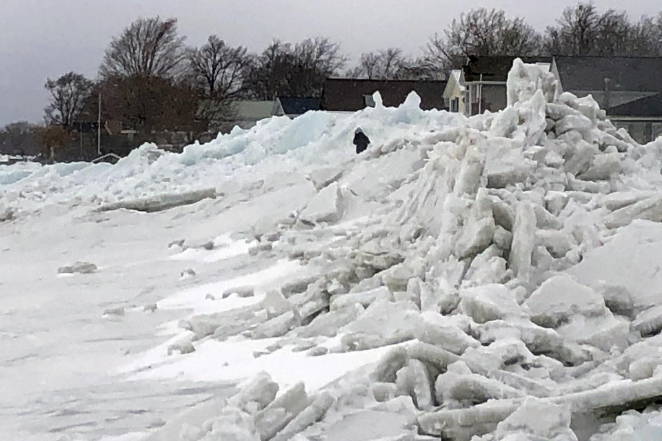 Mounds of ice collect along the Lake Erie shore at Hoover Beach, in Hamburg, NY, Monday, Feb. 25, 2019. High winds howled through much of the nation's eastern half for a second day Monday, cutting power to hundreds of thousands of homes and businesses, closing schools, and pushing dramatic mountains of ice onto the shores of Lake Erie. (AP Photo/Carolyn Thompson)