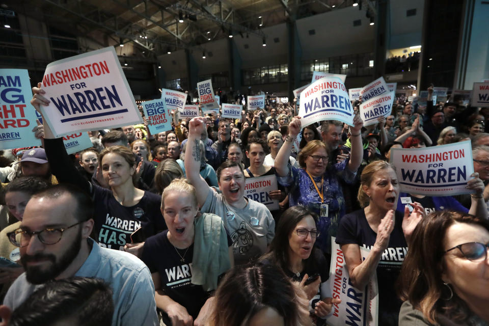 Supporters cheer as Democratic presidential candidate U.S. Sen. Elizabeth Warren, D-Mass., speaks during a campaign event Saturday, Feb. 22, 2020, in Seattle. (AP Photo/Elaine Thompson)