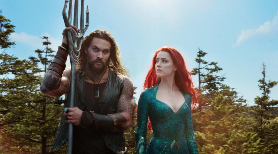 Jason Momoa as Arthur Curry and Amber Heard as Mera in "Aquaman."