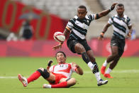 <p>Waisea Nacuqu of Team Fiji wins the ball against Naoki Motomura of Team Japan on day three of the Tokyo 2020 Olympic Games at Tokyo Stadium on July 26, 2021 in Chofu, Tokyo, Japan. (Photo by Dan Mullan/Getty Images)</p> 