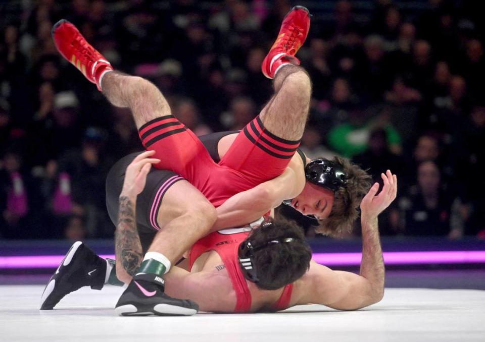 Penn State’s Tyler Kasak controls Rutgers’ Michael Cetta in the 149 lb bout of the match on Monday, Feb. 12, 2024 at the Bryce Jordan Center.