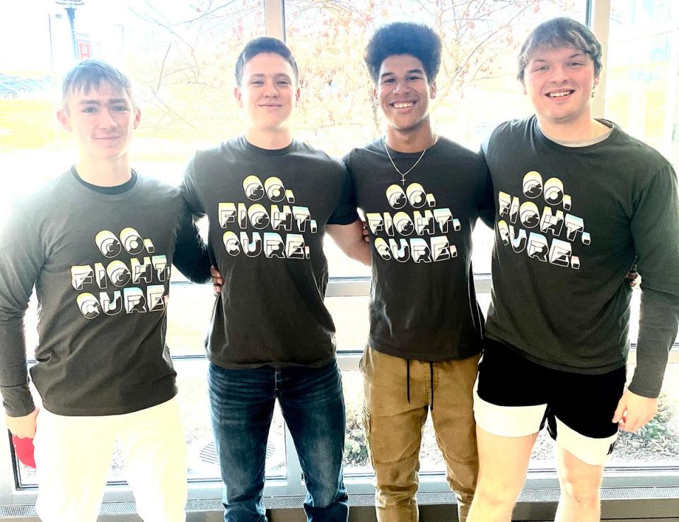 Honesdale boys varsity basketball players are all smiles after working hard to raise funds and awareness for middle school student Leo Nichols' battle against brain cancer. Pictured are (from left): Nate Hugaboom, Karter Kromko, Jeffry Delgado-Santos and Trent Combita.