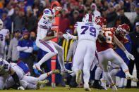 Buffalo Bills quarterback Josh Allen (17) runs up field during the first half of an NFL divisional round playoff football game against the Kansas City Chiefs, Sunday, Jan. 23, 2022, in Kansas City, Mo. (AP Photo/Ed Zurga)