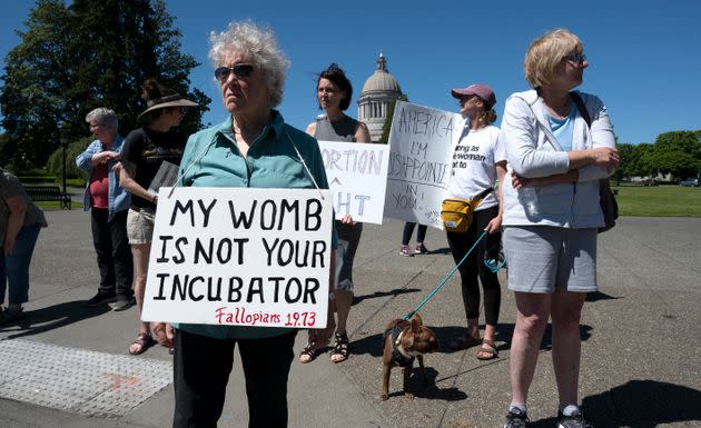 Dr. Kathleen O'Shaunessy of Olympia joins supporters of women's rights as they rally on the Capitol Campus in Olympia, Washington. (Photo: Tony Overman/The News Tribune via Associated Press)