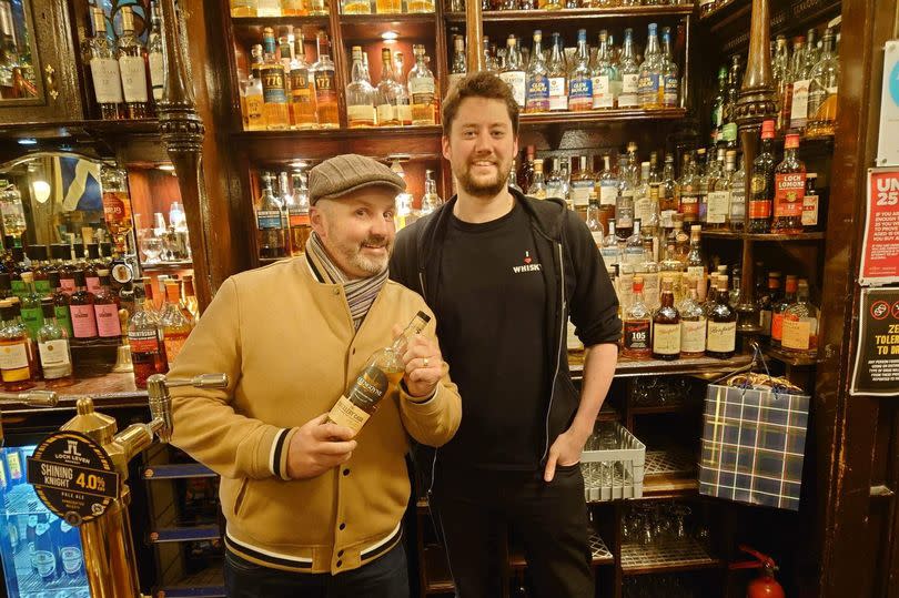 The Pot Still's supervisor Chris Irons was delighted to pose with Neighbours star Ryan Moloney, who plays Toadie in the hit show.