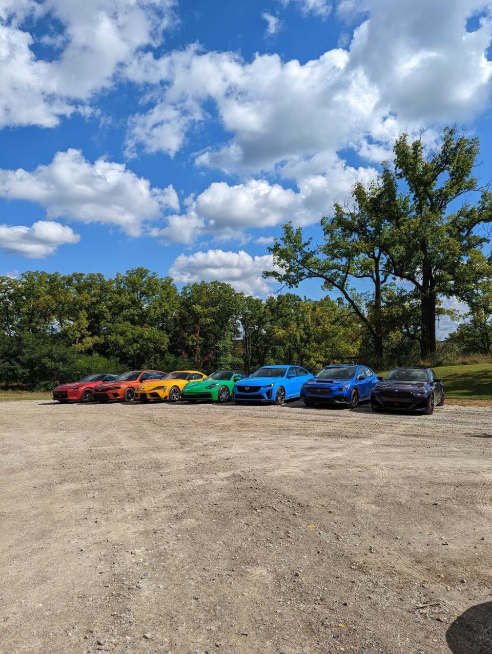 a rainbow of sports cars