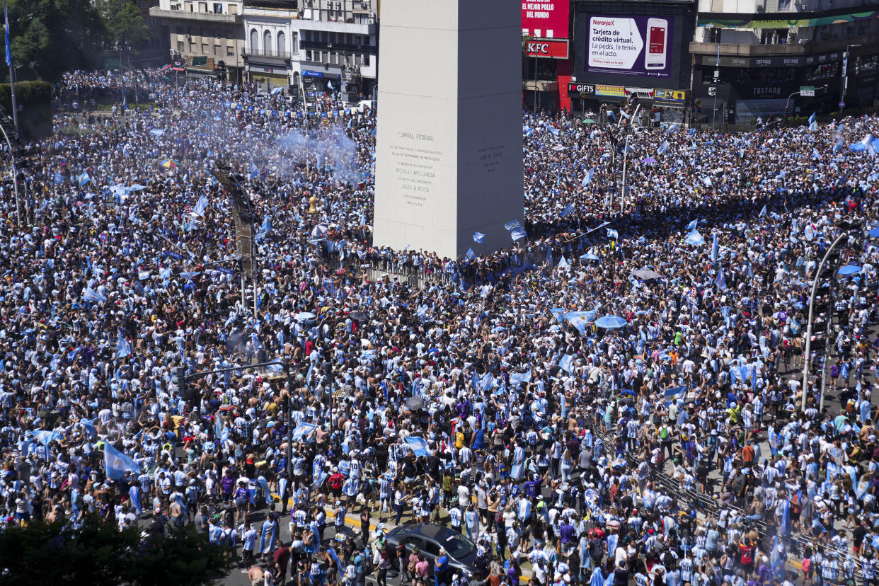 Argentine soccer fans celebrate their team's World Cup victory over France, in Buenos Aires, Argentina, Sunday, Dec. 18, 2022. (AP Photo/Matilde Campodonico)