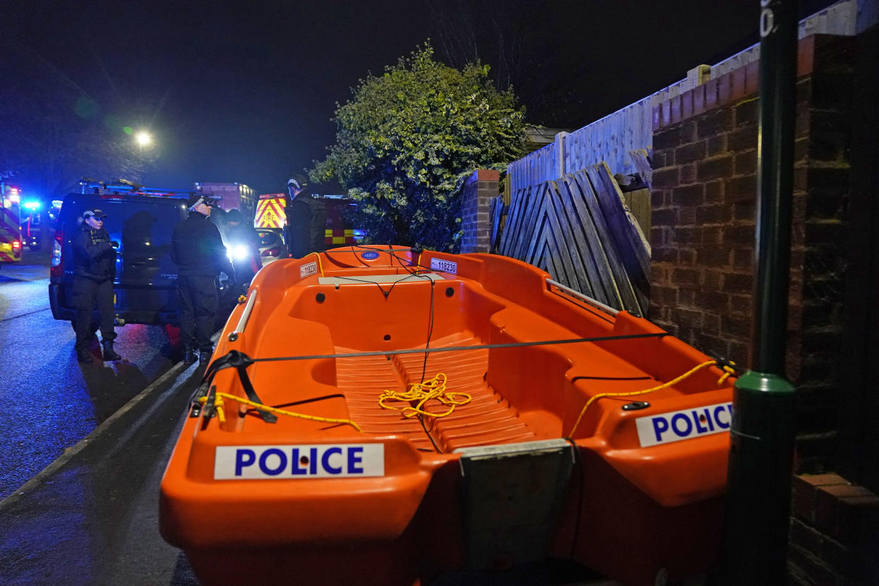 Emergency personnel at the scene near Babbs Mill Park in Kingshurst, Solihull after a serious incident where several people are believed to be in a critical condition after being pulled from the lake. Picture date: Sunday December 11, 2022.