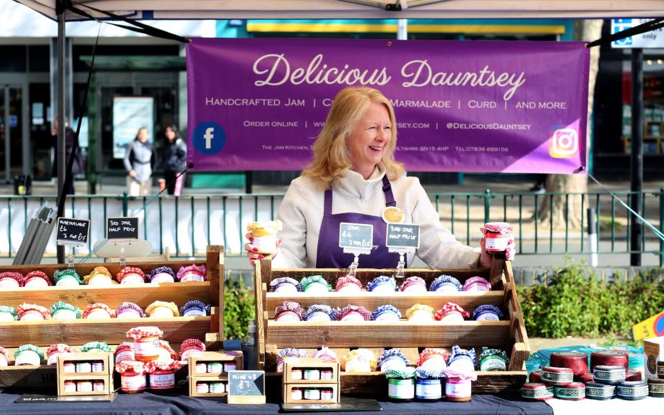 Claire Mellor-Hill at her food stall in a food market