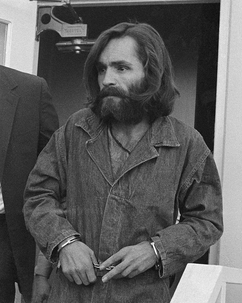closeup of manson with handcuffs
